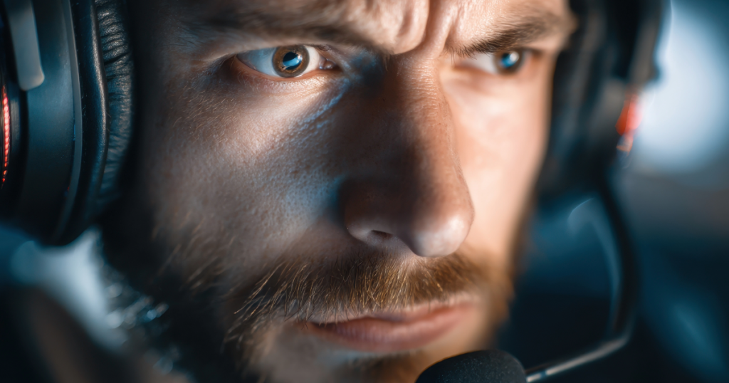 A player mid-session staring blankly at the screen, visibly out of sync with the gameplay